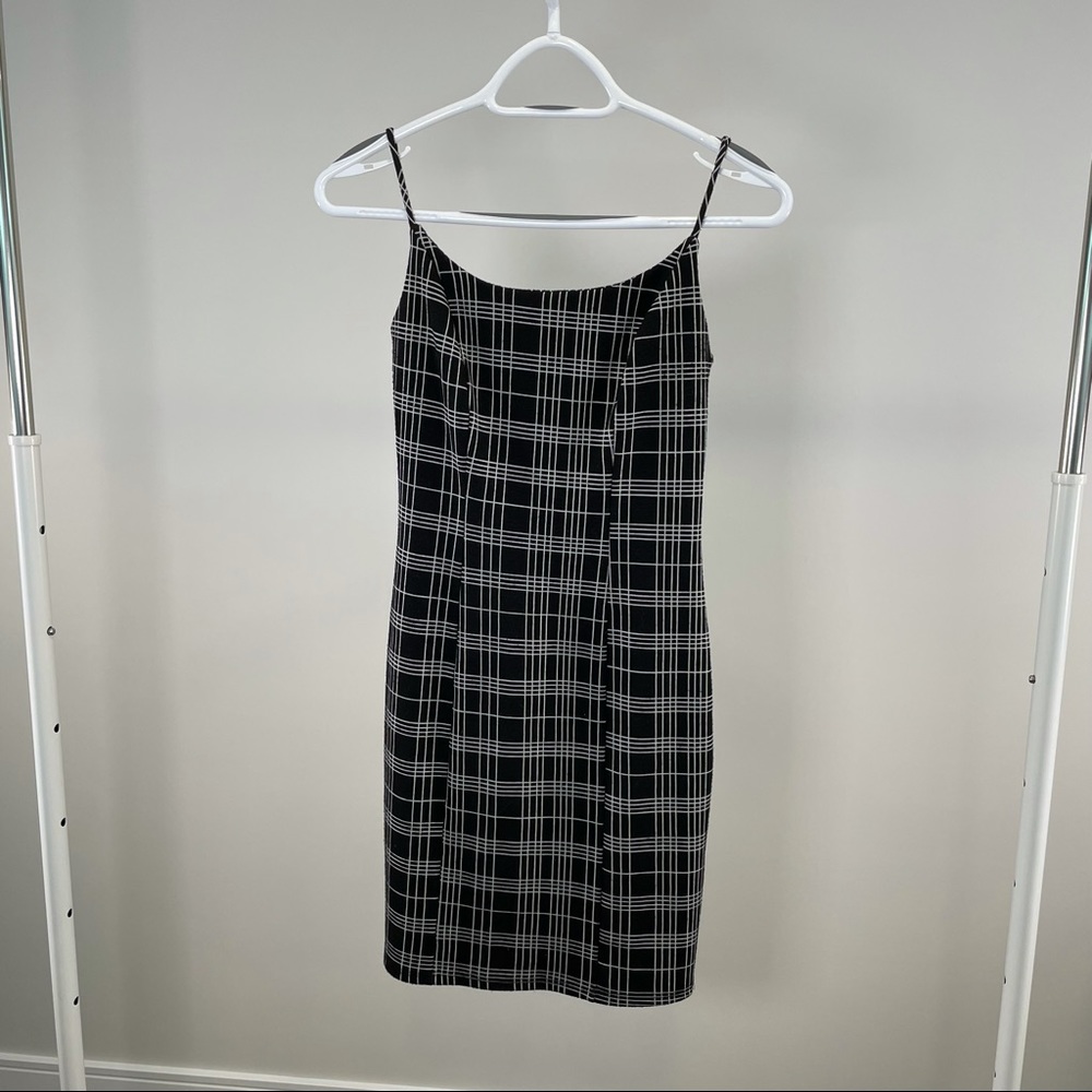 Black Bodycon mini dress from M Boutique that features a white check pattern